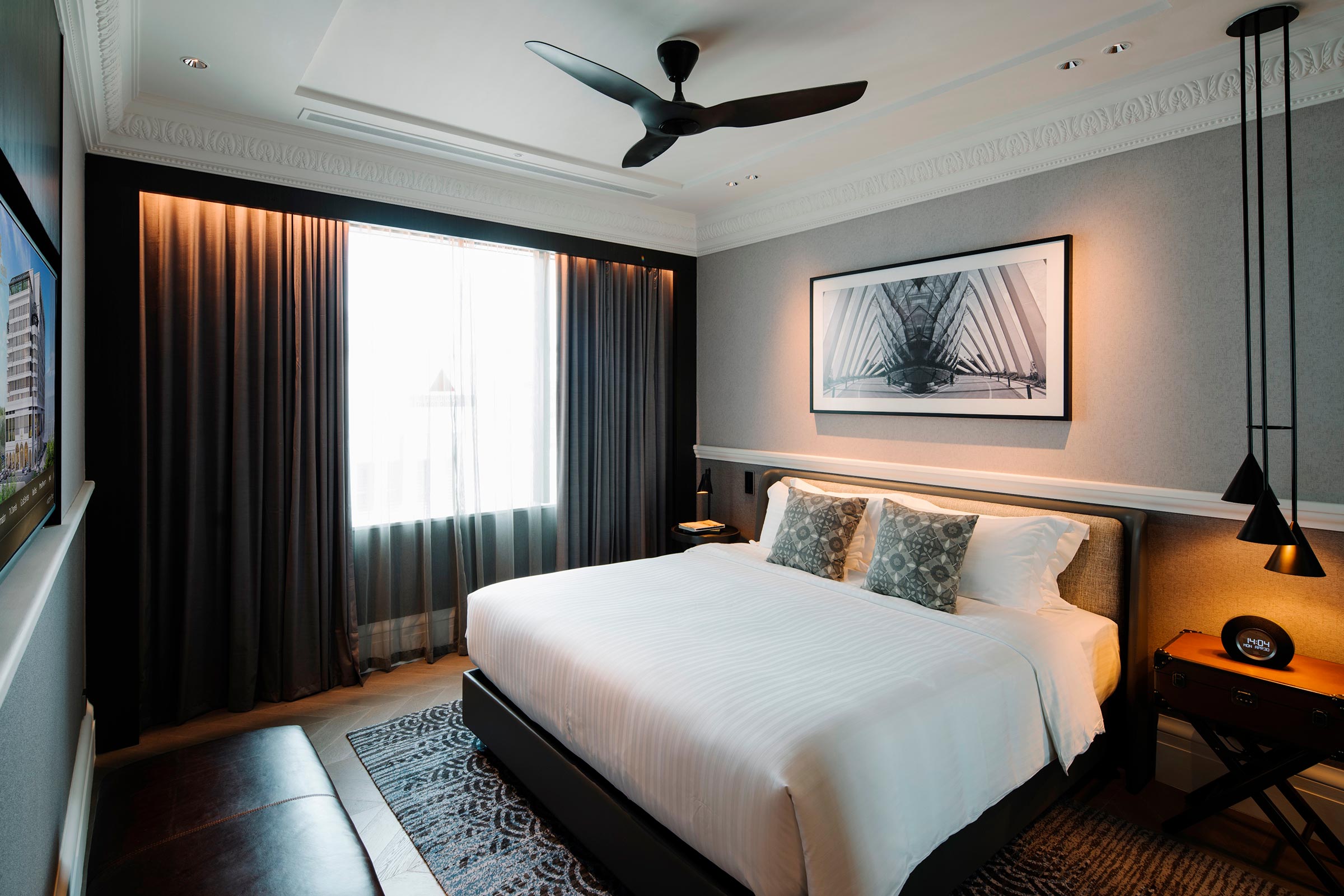 bedroom with natural light and ceiling fan